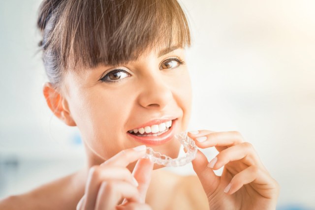 girl smiling with invisalign